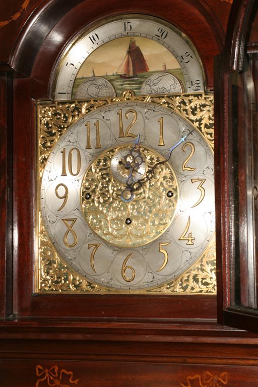 English Elliott clock in inlaid mahogany case