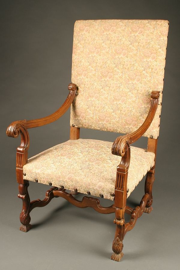 French Louis XIV style arm chair with stretcher base.