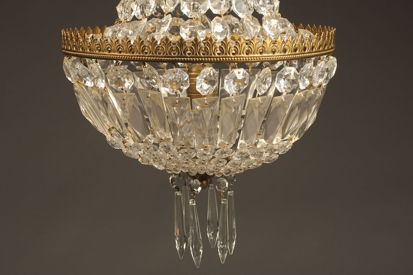 Antique bronze and crystal hall chandelier with single light.