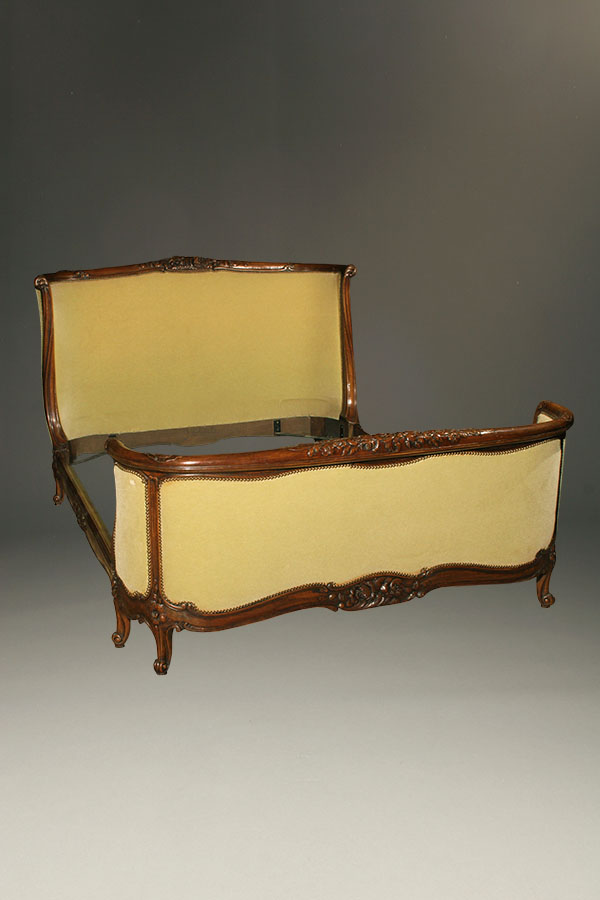 19th century French Louis XV queen size bed in walnut.