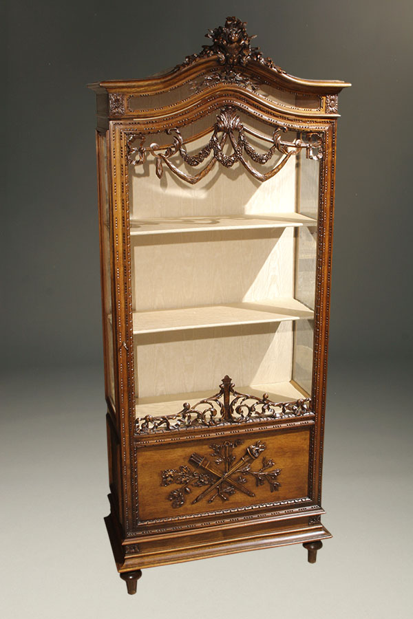 antique louis xvi style curio cabinet.