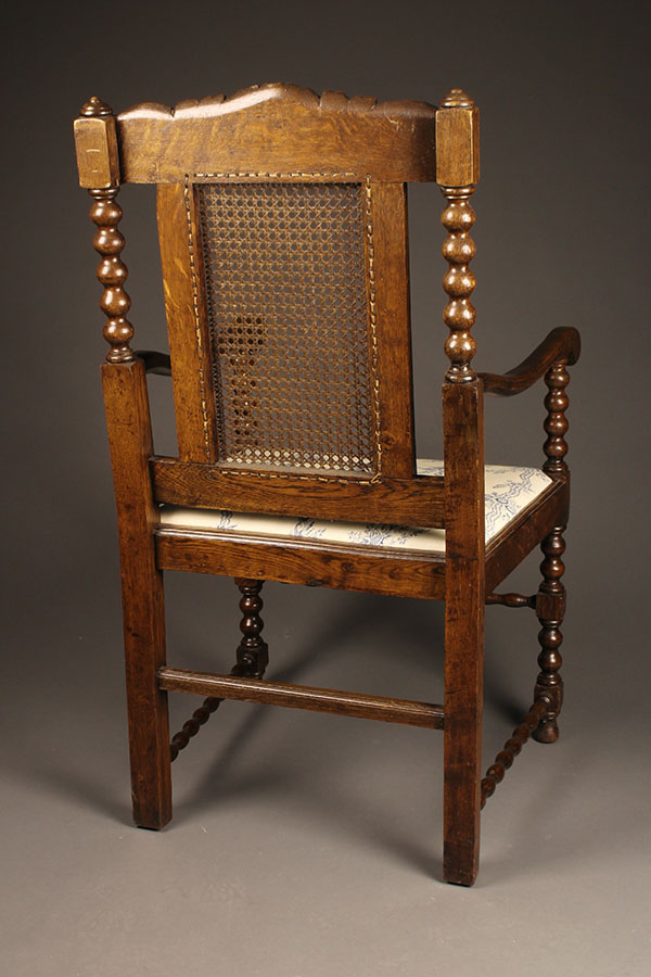 Pair of antique Jacobean arm chairs.