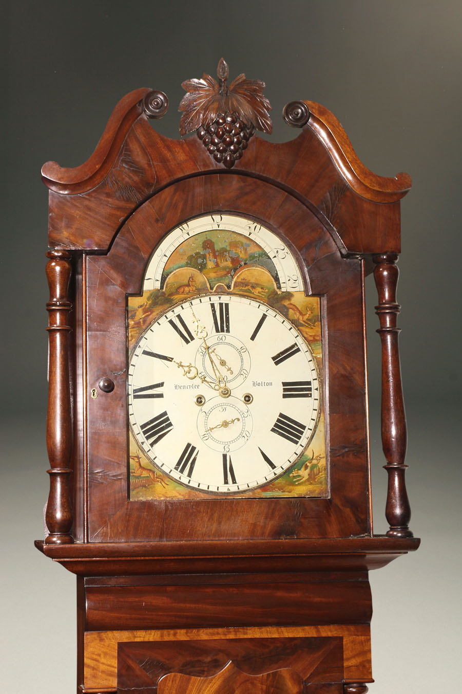 Antique English tall case clock with beautiful mahogany case and 8 day