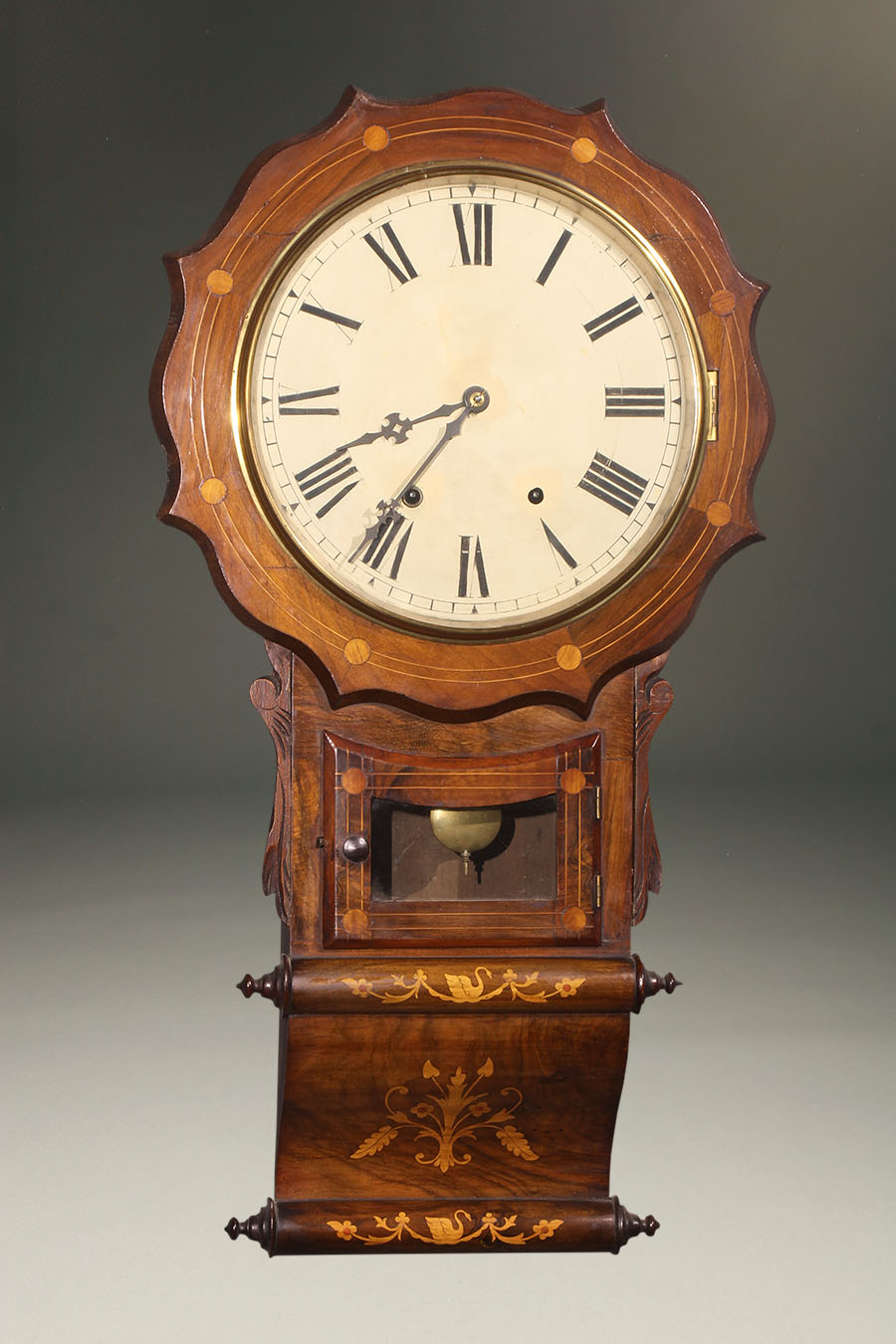 Antique New Haven Clock Company wall clock with walnut case.