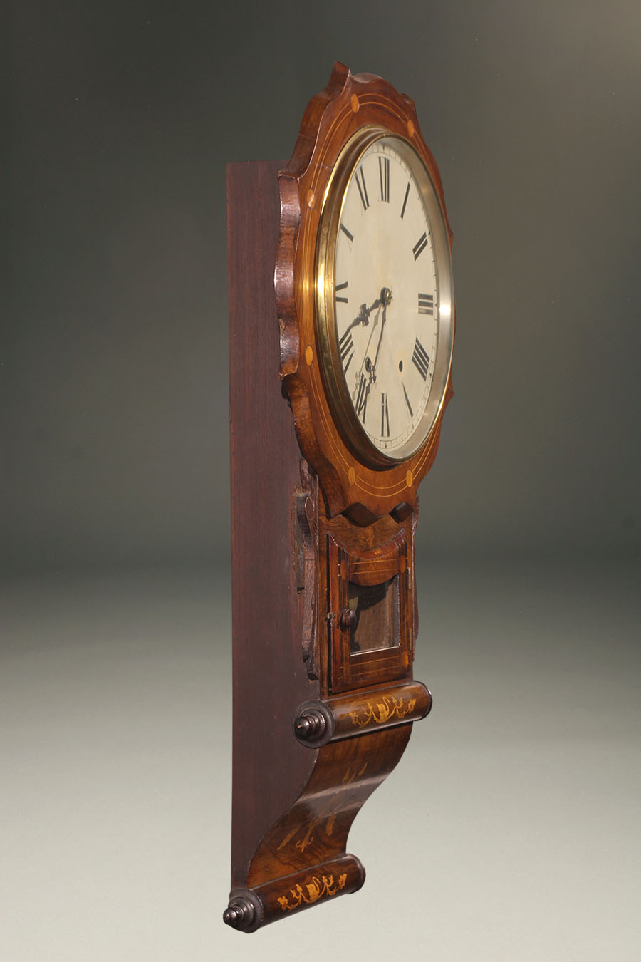 Antique New Haven Clock Company wall clock with walnut case.