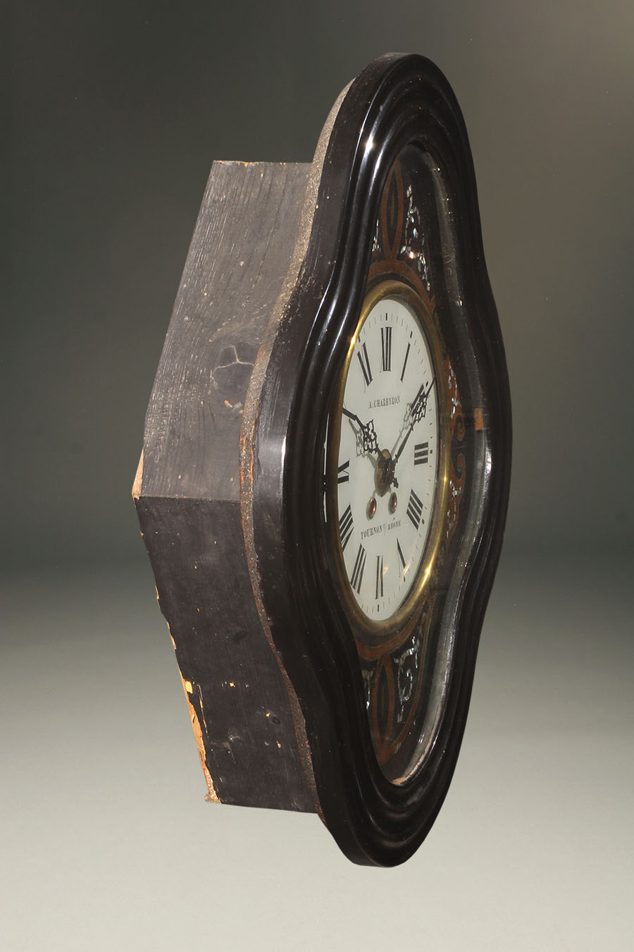 Antique French Morez picture frame wall clock with mother of pear inlay.