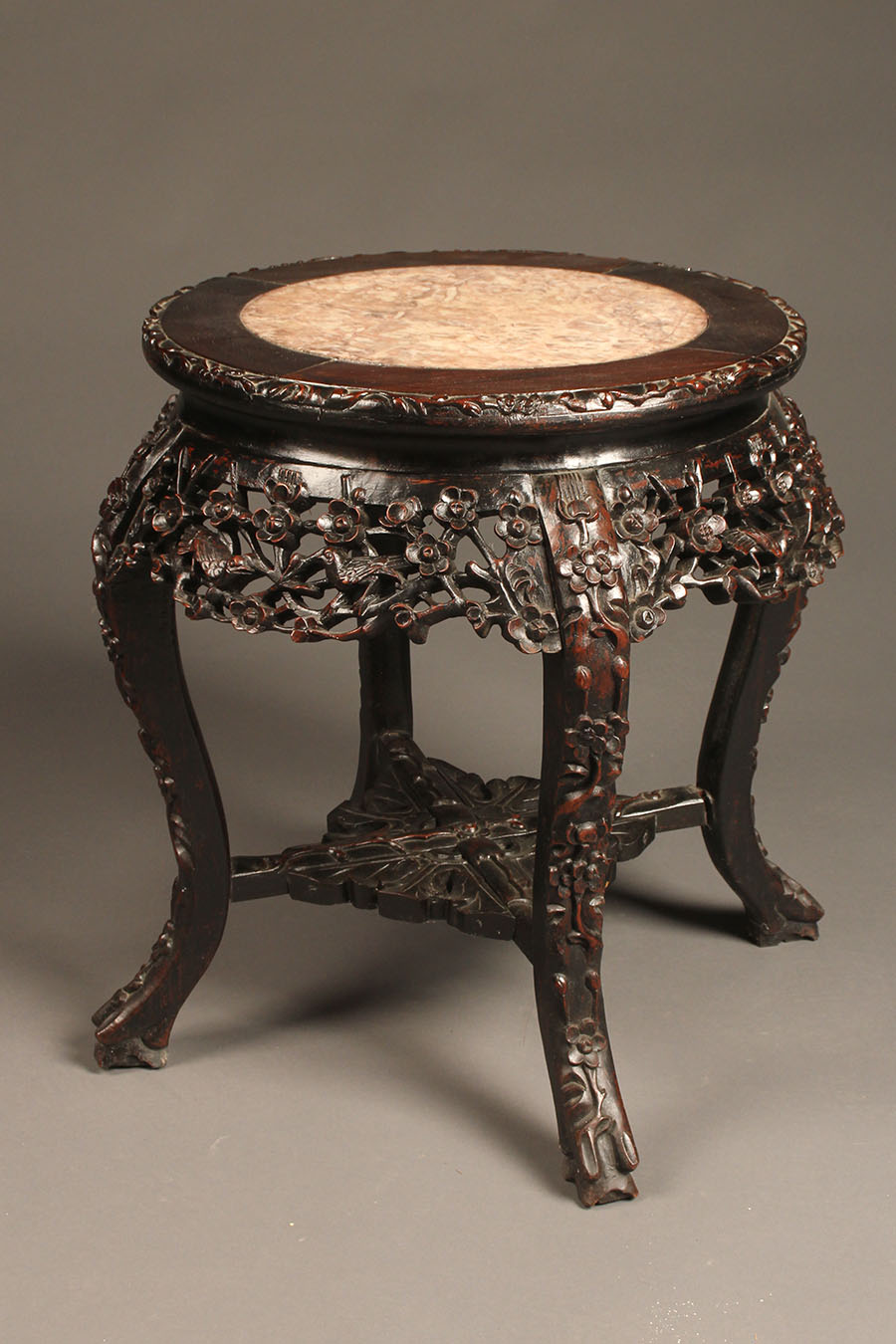 Antique low Chinese table with hand carved birds and flowers in rosewood