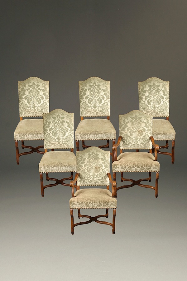 Set of antique French Louis XIII style dining chairs in oak, circa 1890.