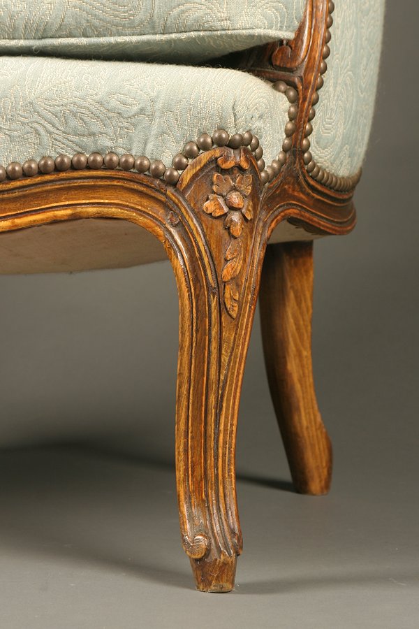 French 19th century Louis XV arm chair with blue upholstery.