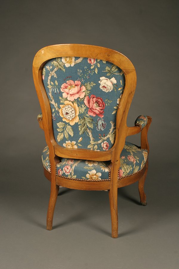 Mid 19th century Louis Philippe French arm chair in walnut.