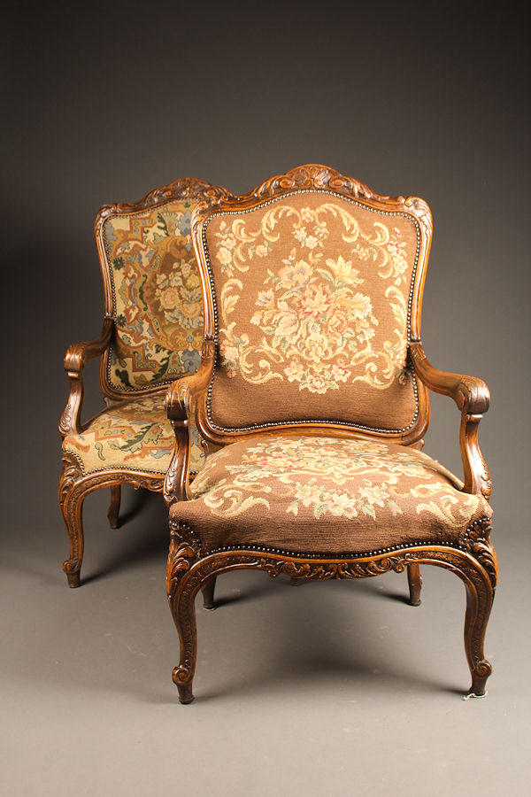 Pair of Louis XV style French armchairs with original needlepoint.