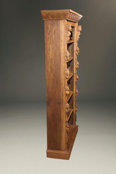 Heavily carved Belgian oak bookcase with adjustable shelves, circa 1890