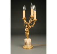 19th century French figural candlestick lamp with cherub