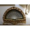 Lace fan in ornate gold shadow box