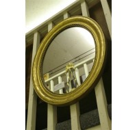 French 19th century Louis Phillippe oval gilded mirror, circa 1860