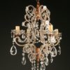 Antique 4 arm iron, wood and crystal Italian chandelier, circa 1880