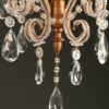 Antique 4 arm iron, wood and crystal Italian chandelier, circa 1880.