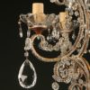 Antique 4 arm iron, wood and crystal Italian chandelier, circa 1880.