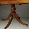 Antique English Regency oval table.
