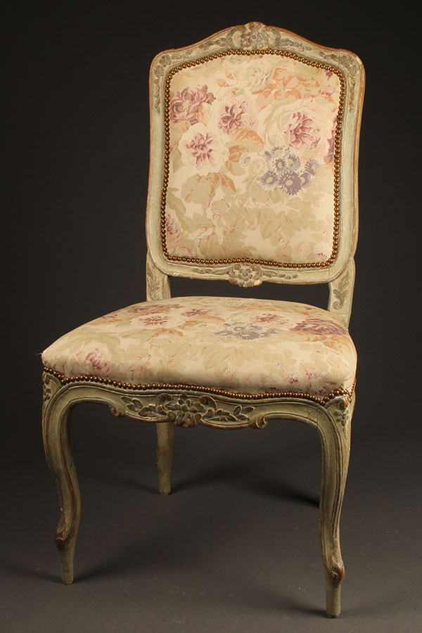 Antique pair of French Louis XV style side chairs.