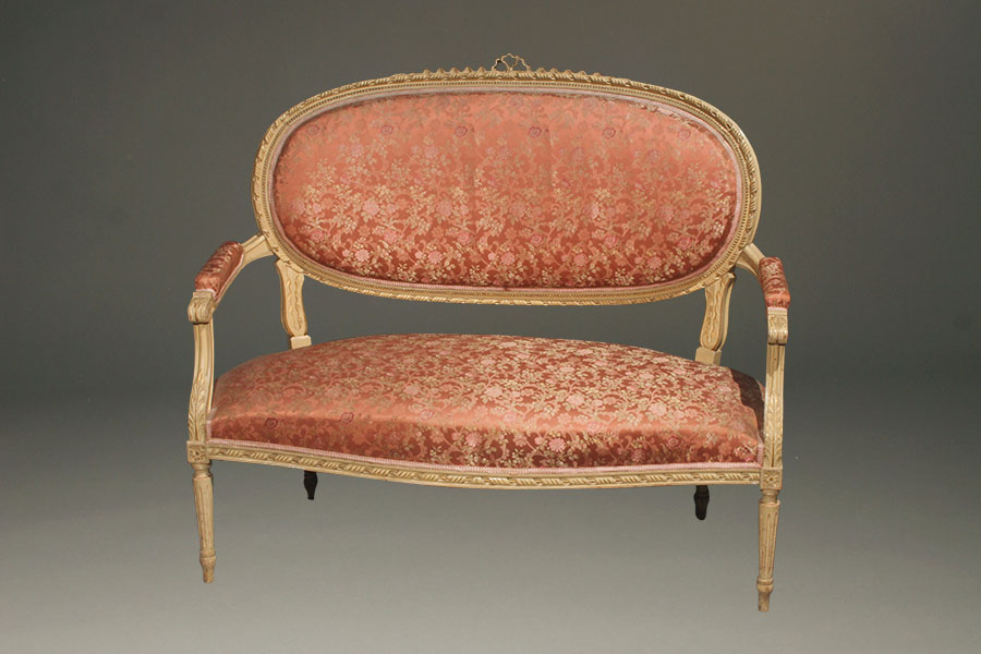 Antique Louis XVI style settee.