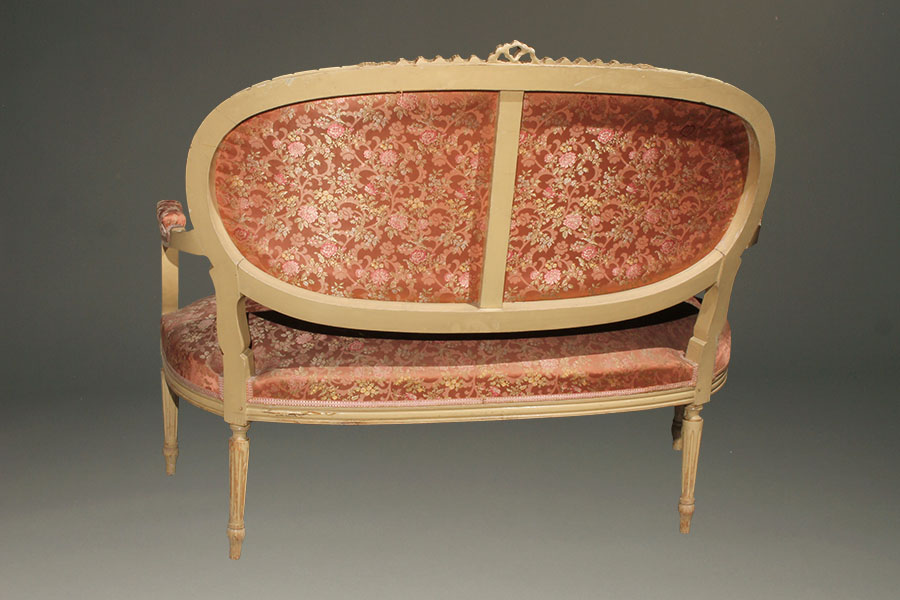 Antique Louis XVI style settee.