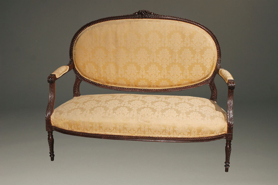 Antique Louis XVI style settee.