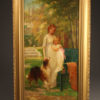 Oil on canvas featuring a woman, child and dog A5493A