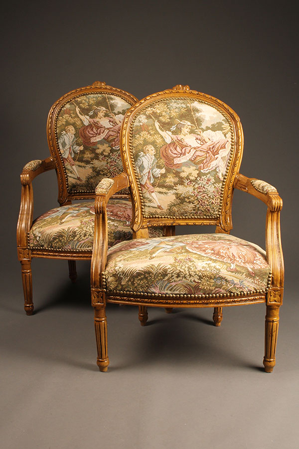 Custom French Louis XVI style arm chairs.