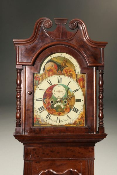 Mid 19th century English tall case clock with plum pudding mahogany case, circa 1860.