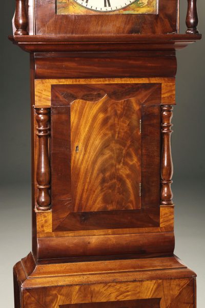 19th century English tall case clock with wonderful mahogany case and hour striking 8 day movement