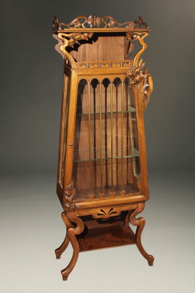 Wonderful French Art Nouveau cabinet in mahogany with glass shelves