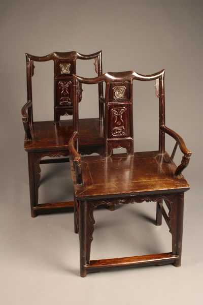 Mid 19th century pair of Chinese court chairs in teak, circa 1850-60.