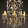 Late 19th century Italian six arm iron, wood, and crystal chandelier