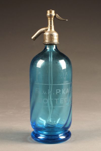 Blue seltzer water bottle from France dated 1938.