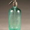 Aqua colored seltzer water bottle from France dated 1913