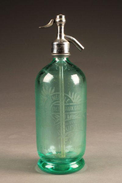 Aqua colored seltzer water bottle with etched design from France, circa 1930's.