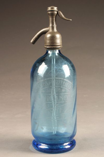Blue seltzer water bottle from France with etched design and writing, circa 1920's.