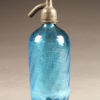 Blue seltzer water bottle from France with etched design, circa 1930's.