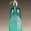 Blue seltzer water bottle from France with etched design, circa 1930's.