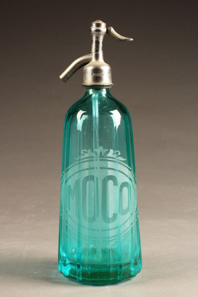 Blue seltzer water bottle from France with etched design, circa 1930's.