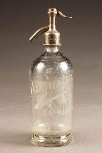 Clear seltzer water bottle from France dated 1937.