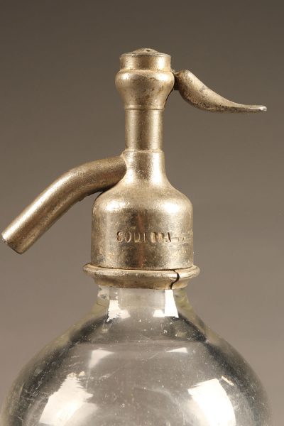 Clear seltzer water bottle from France dated 1937.