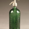 Green seltzer bottle with intricate design from France, circa 1950's.