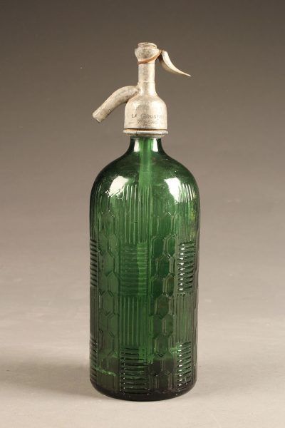 Green seltzer bottle with intricate design from France, circa 1950's.