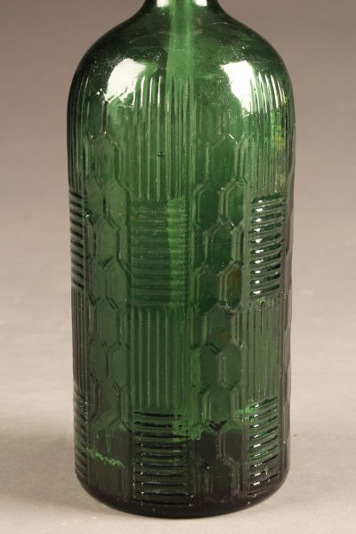 Green seltzer bottle with intricate design from France, circa 1950's.