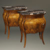 Late 19th century pair of Italian bombe commodes in burl walnut with marble tops