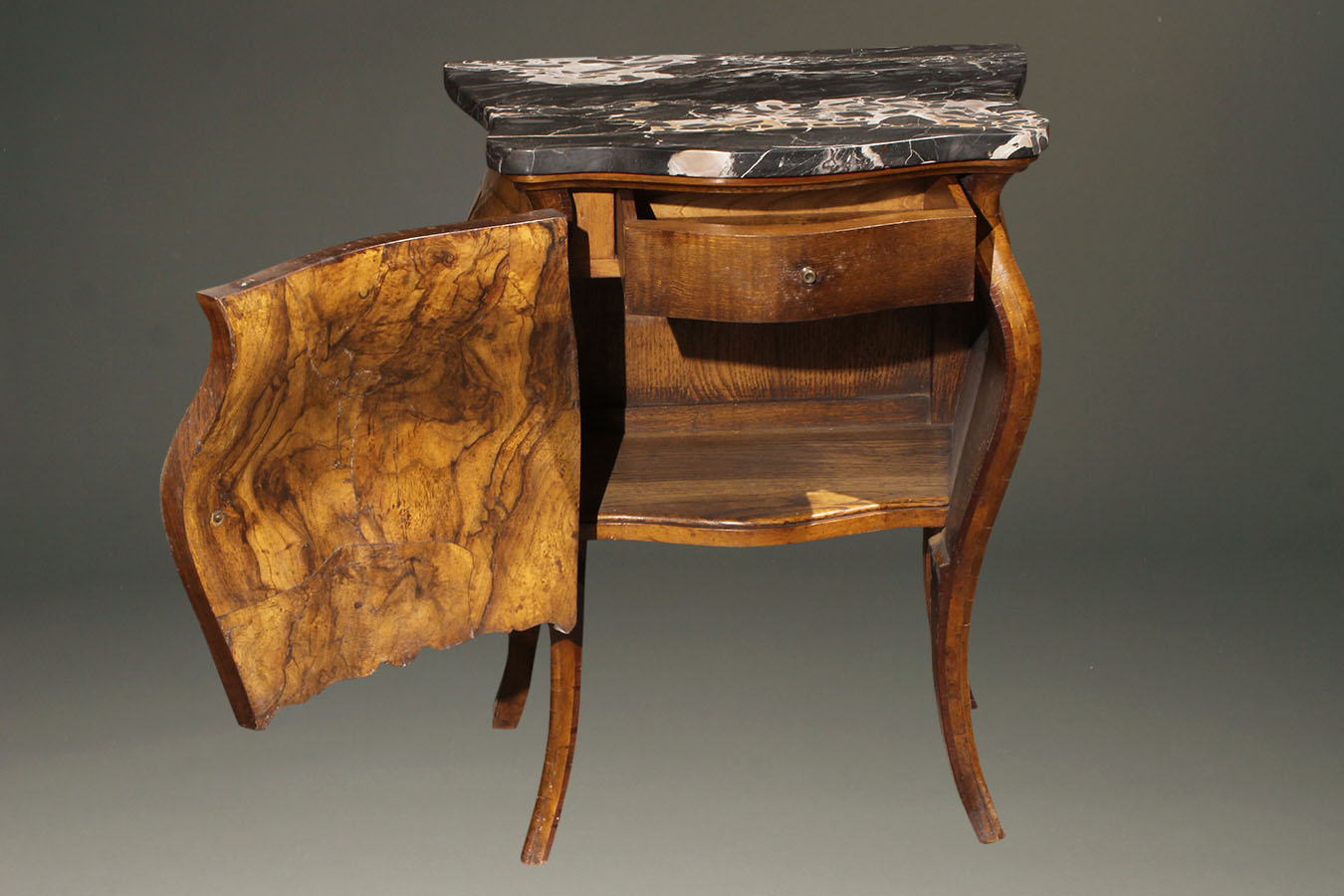 Antique of Italian commodes in burl walnut with marble tops.