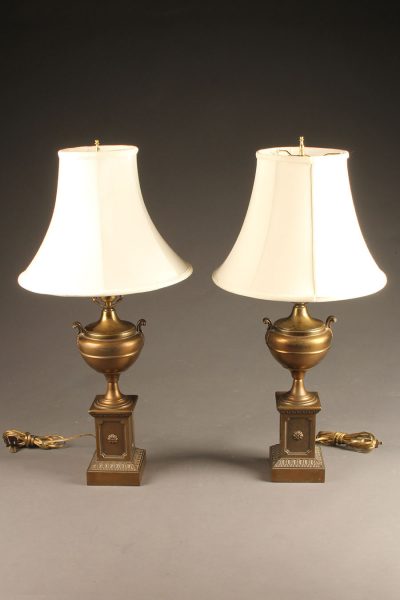 Nice pair of brass urn shaped lamps with silk shades.