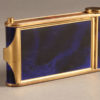 Beautiful ladies compact with lipstick applicator, cigarette case and music box playing the Blue Danube.